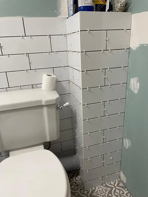 Tile installation around toilet Kent