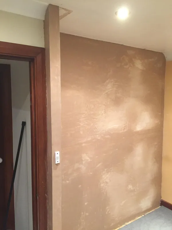 Plastered partition wall to divide a room on a conversion project in Kent