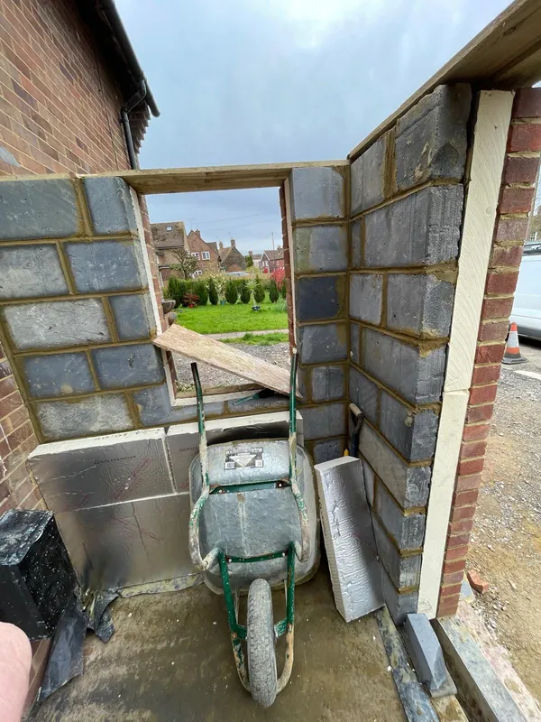 Block installation on porch extension Kent