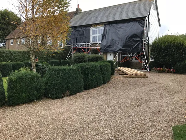 Sheeting over exterior of house for protection on a cladding project Kent
