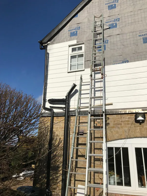 White cladding installation on the exterior of the house Kent