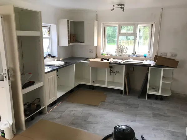 Kitchen cupboards being installed