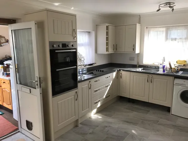 Kitchen cupboards being installed
