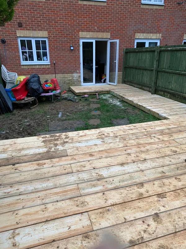 Boarded deck area installation for a local landscaping project in Kent