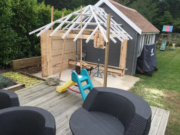Custom built summer house side veranda extension roof installation