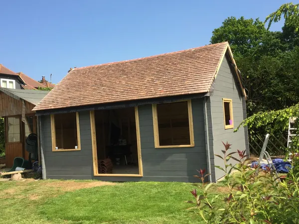Window and door frame installation on the custom built summer house project