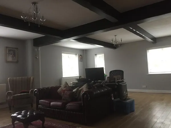 Completed painting and decorating project with grey walls, white wood work and white ceilings in Kent