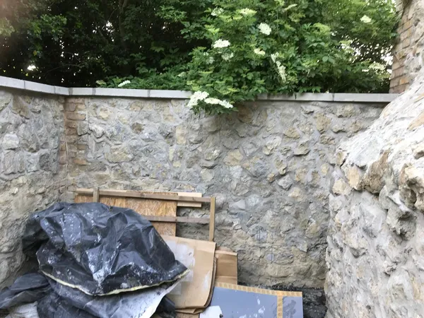 Stone wall with top slab for an extension project, Kent