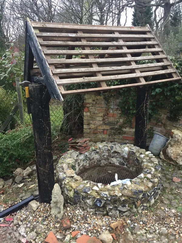 Stone well roof repair project, Kent