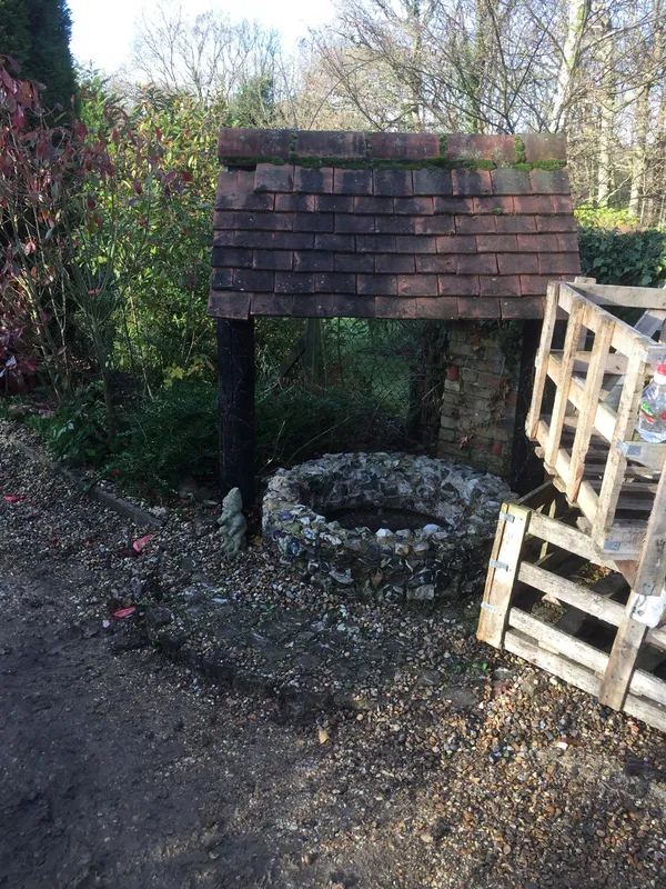 Stone well roof repair project, Kent