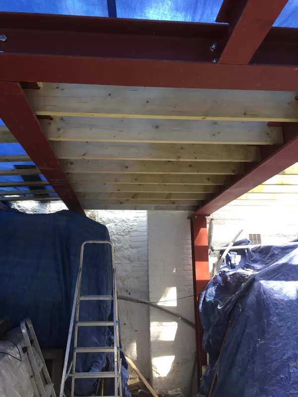 Wooden floor and ceiling structure for an extension project, Kent