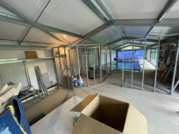 Interior metal structure inside the swimming pool area, Ashford