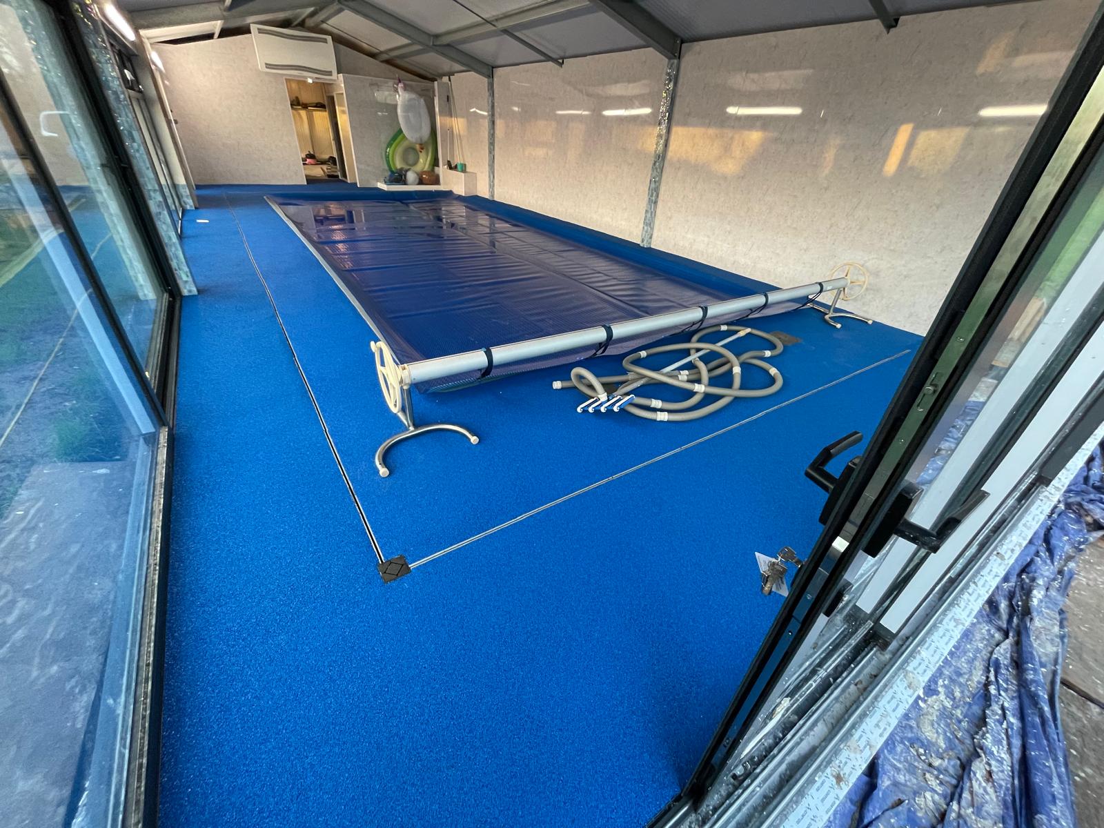 Back view of swimming pool floor installation