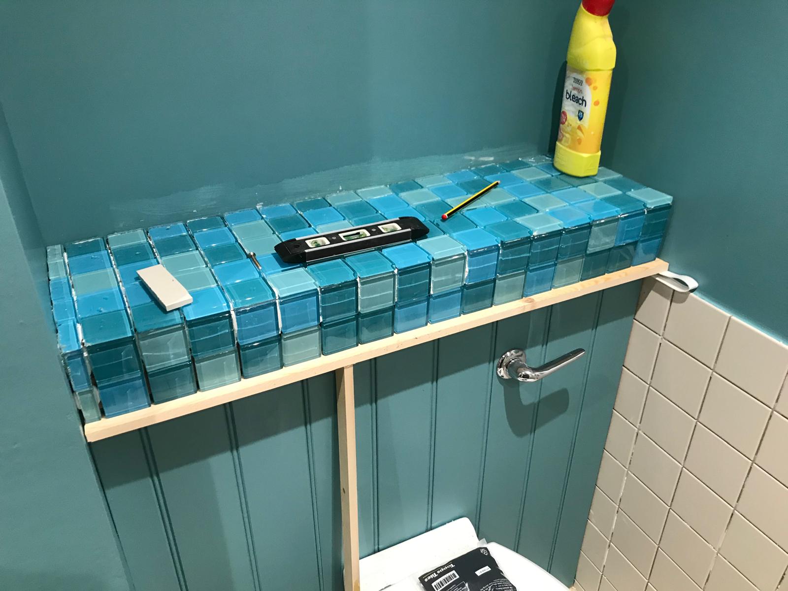 Bathroom installation project with mosaic tile installation