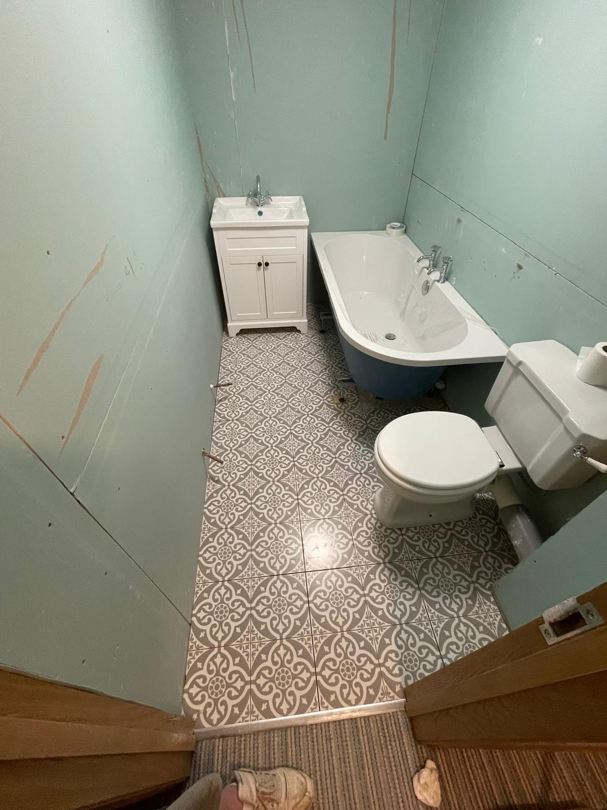 Bathroom installation project with patterned tiles