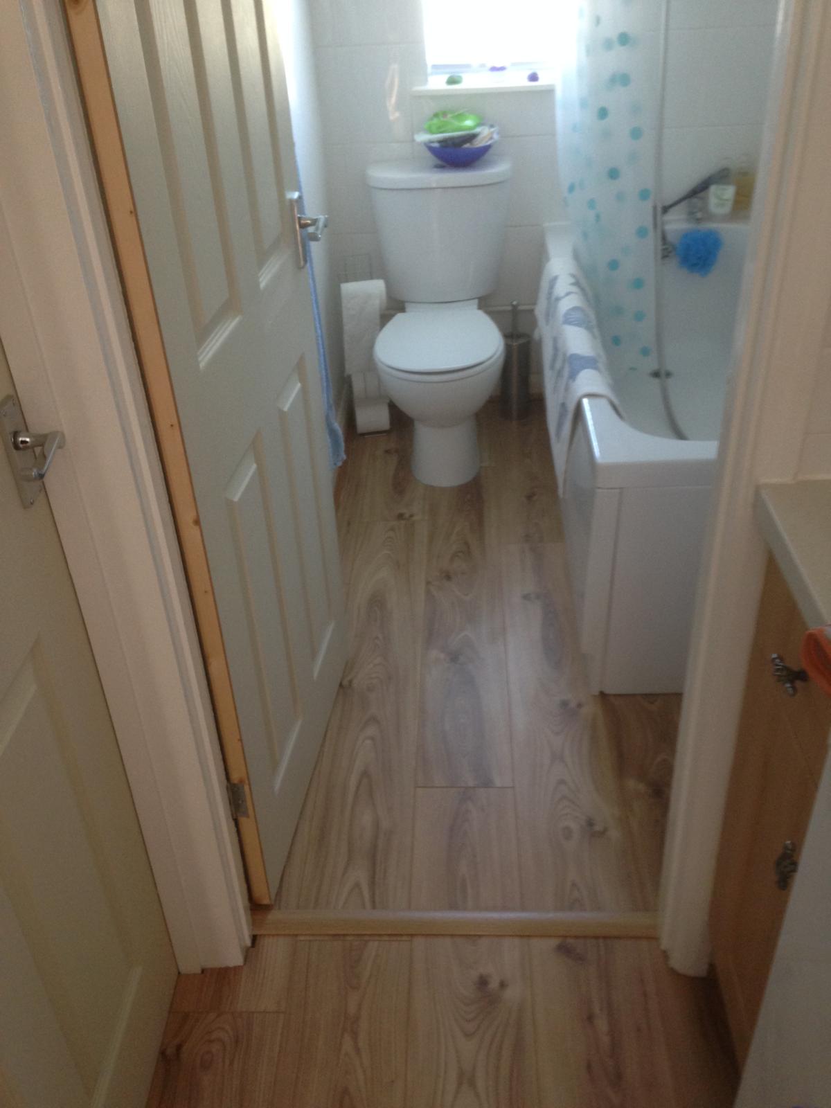 Bathroom project with laminate floor installation