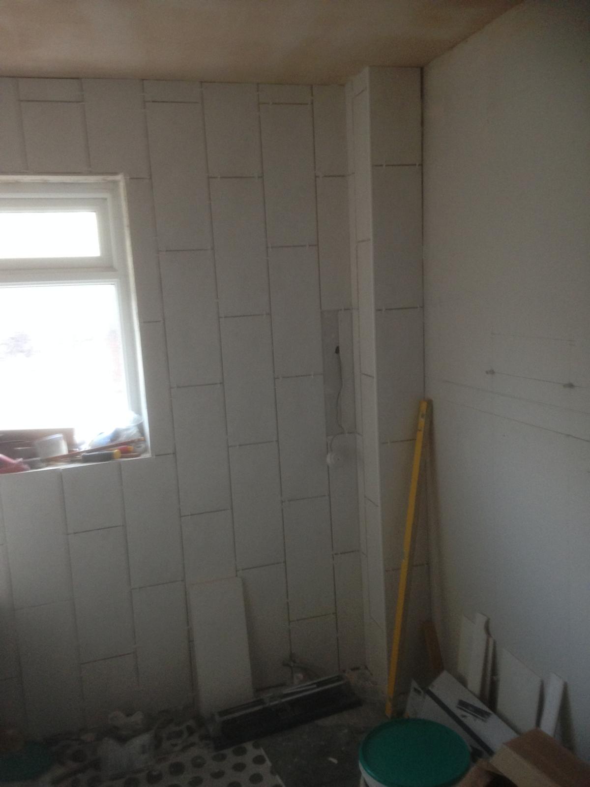 Bathroom wall tile installation 