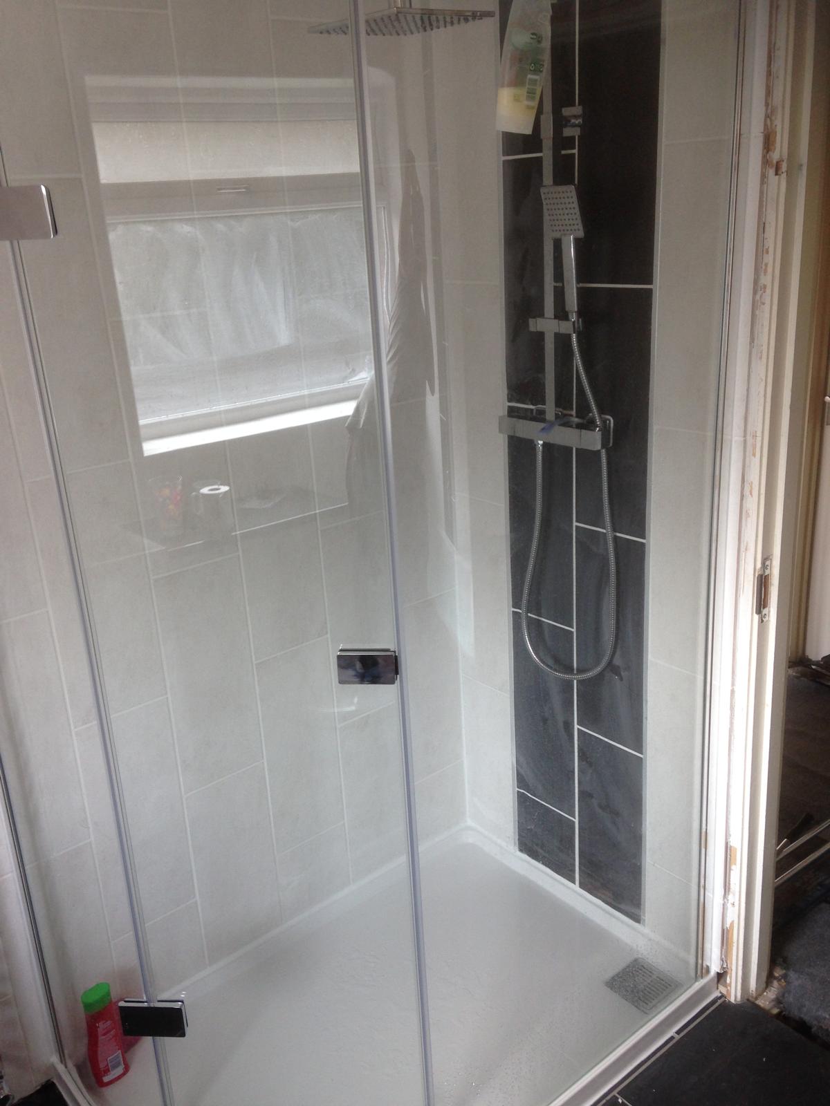 Bathroom wall tile installation inside shower 