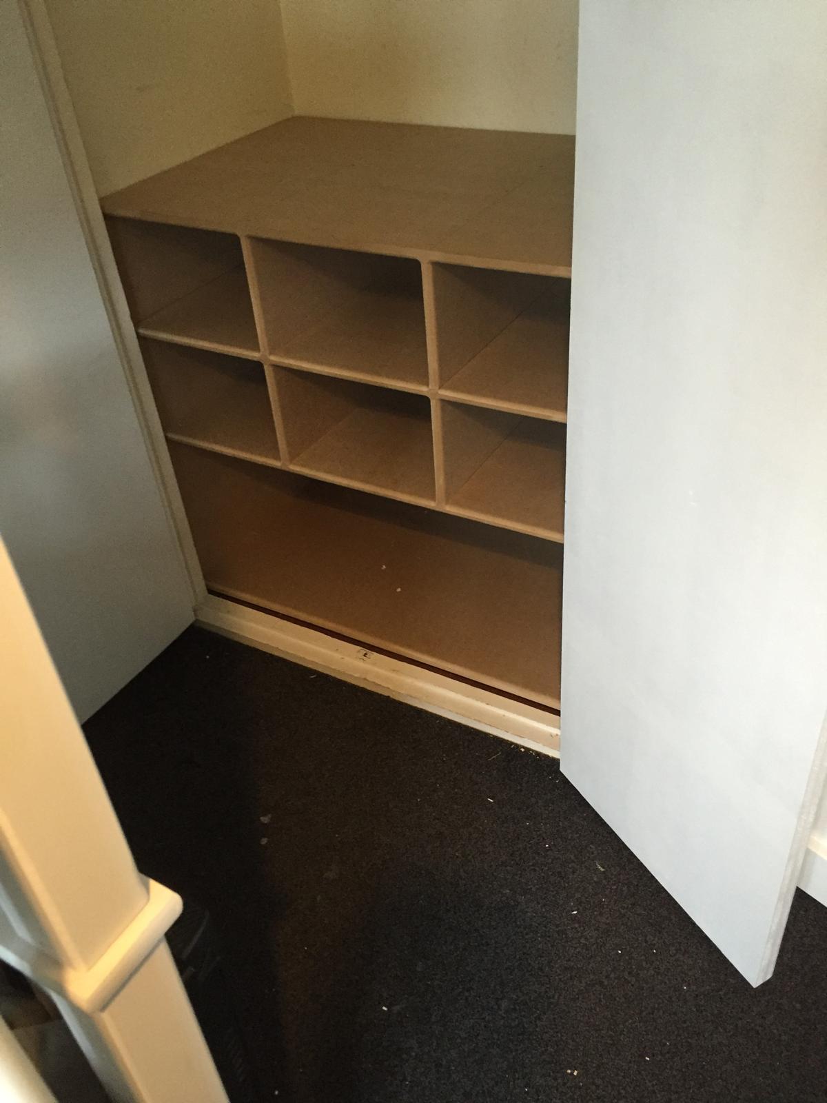 Bespoke sheving made for the inside f a wardrobe for a decorating project