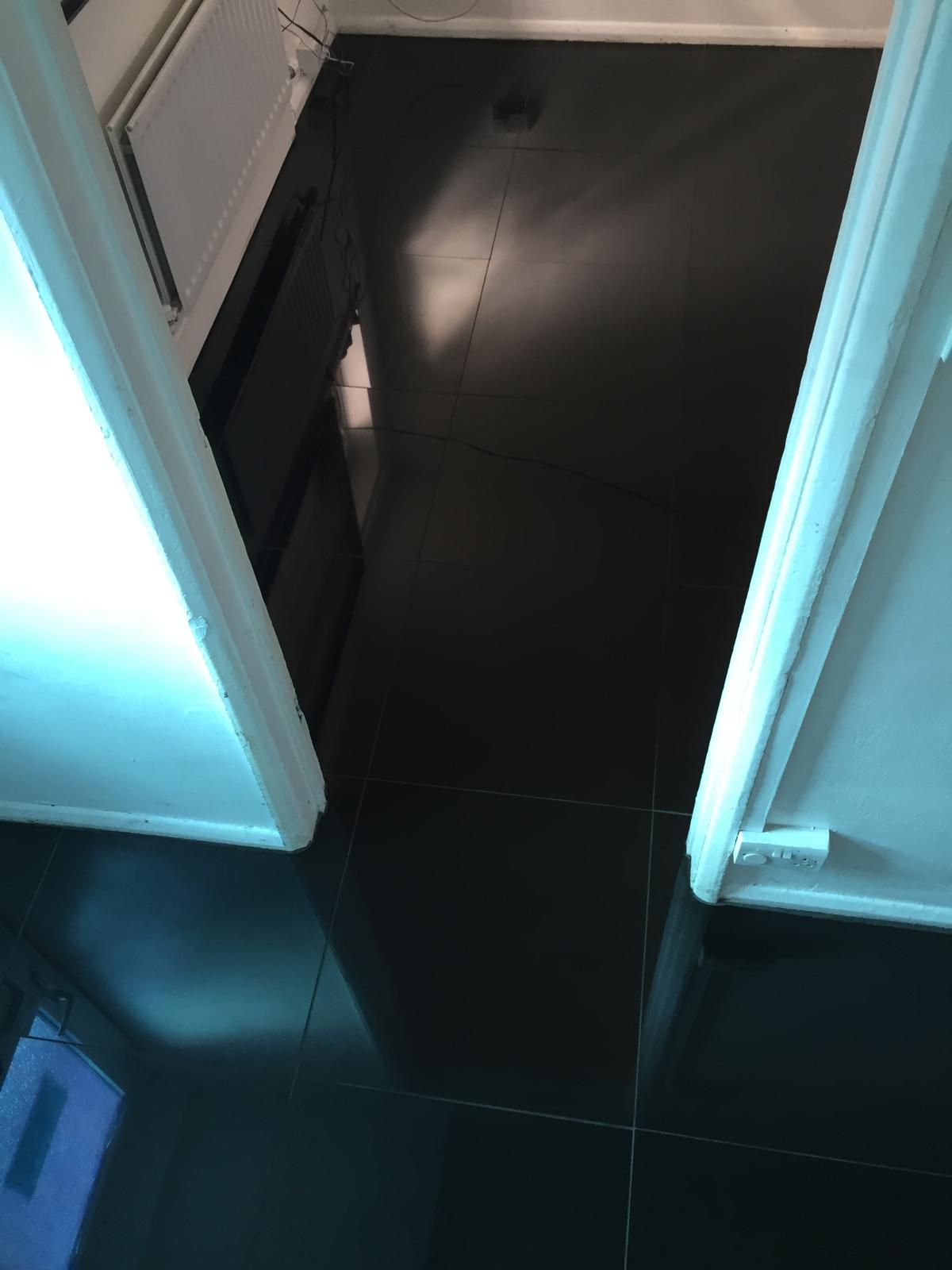 Black porcelain tile installation 