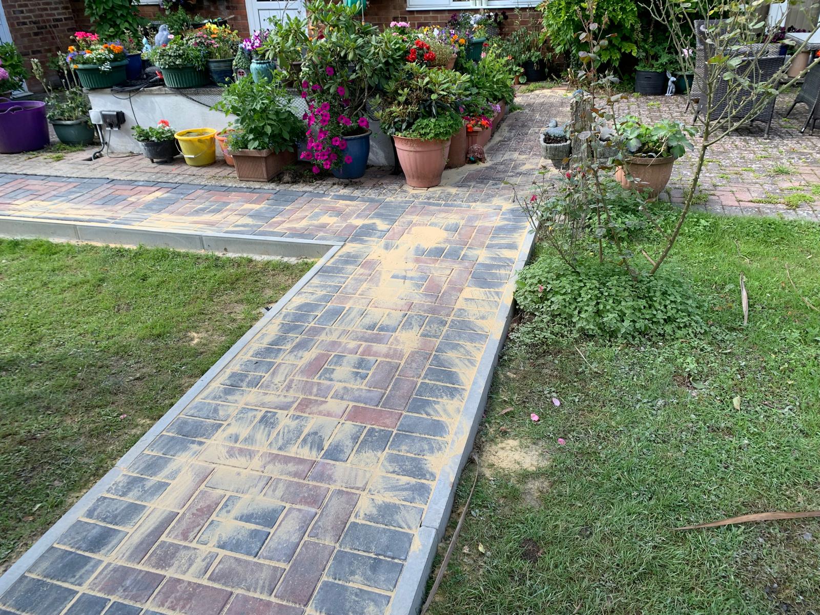 Block paved pathway in a garden for a local project