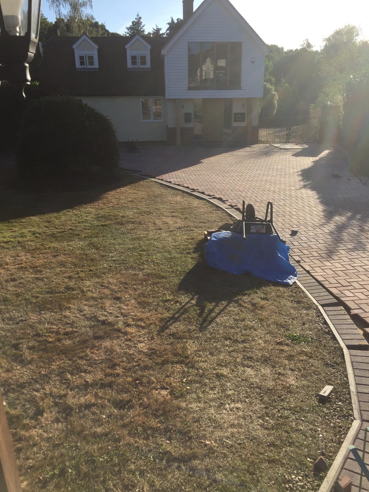 Block paving edging on a driveway for a local project 