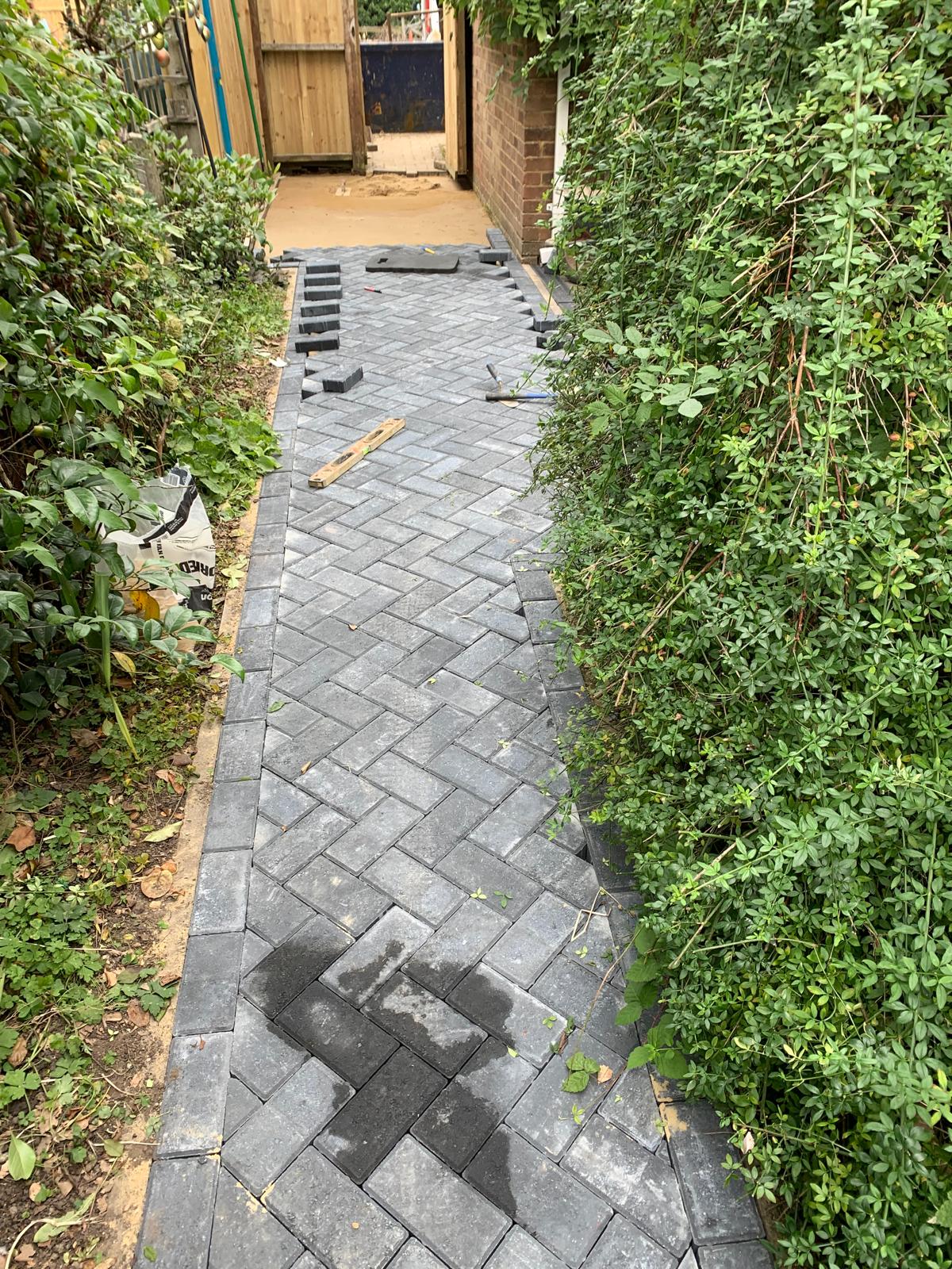 Block paving pathway project for a landscaping project