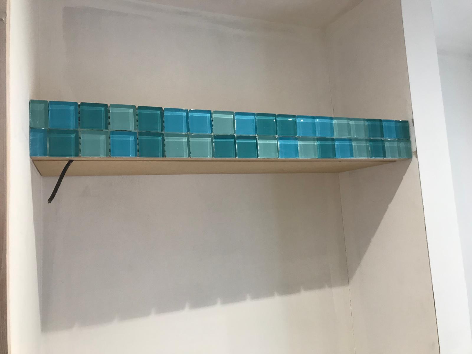 Blue Mosaic decorated shelving for lcal bathroom project in Kent