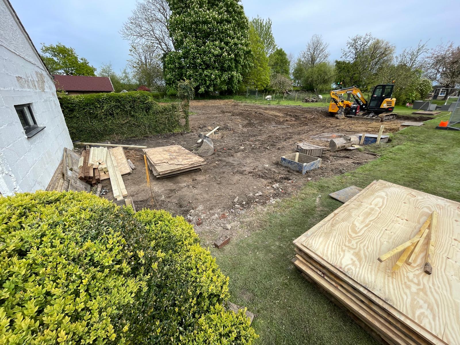 Boards and wooden planks for keeping the swimming pool dig in place