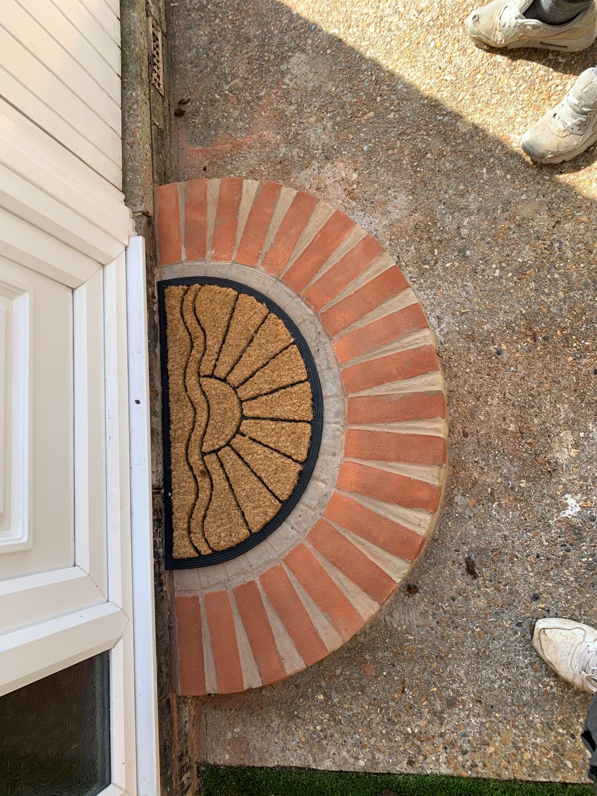 Brick curved front door step installation