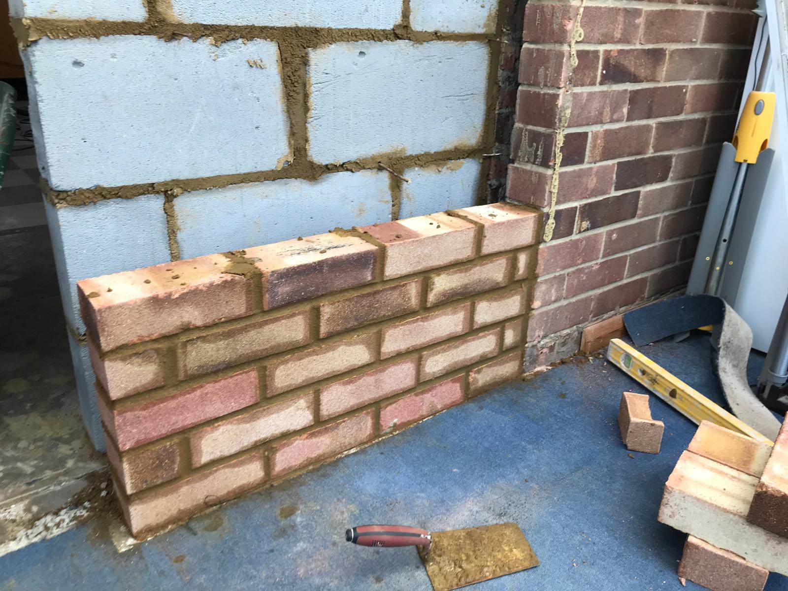 Brick wall extension on a kitchen installation project