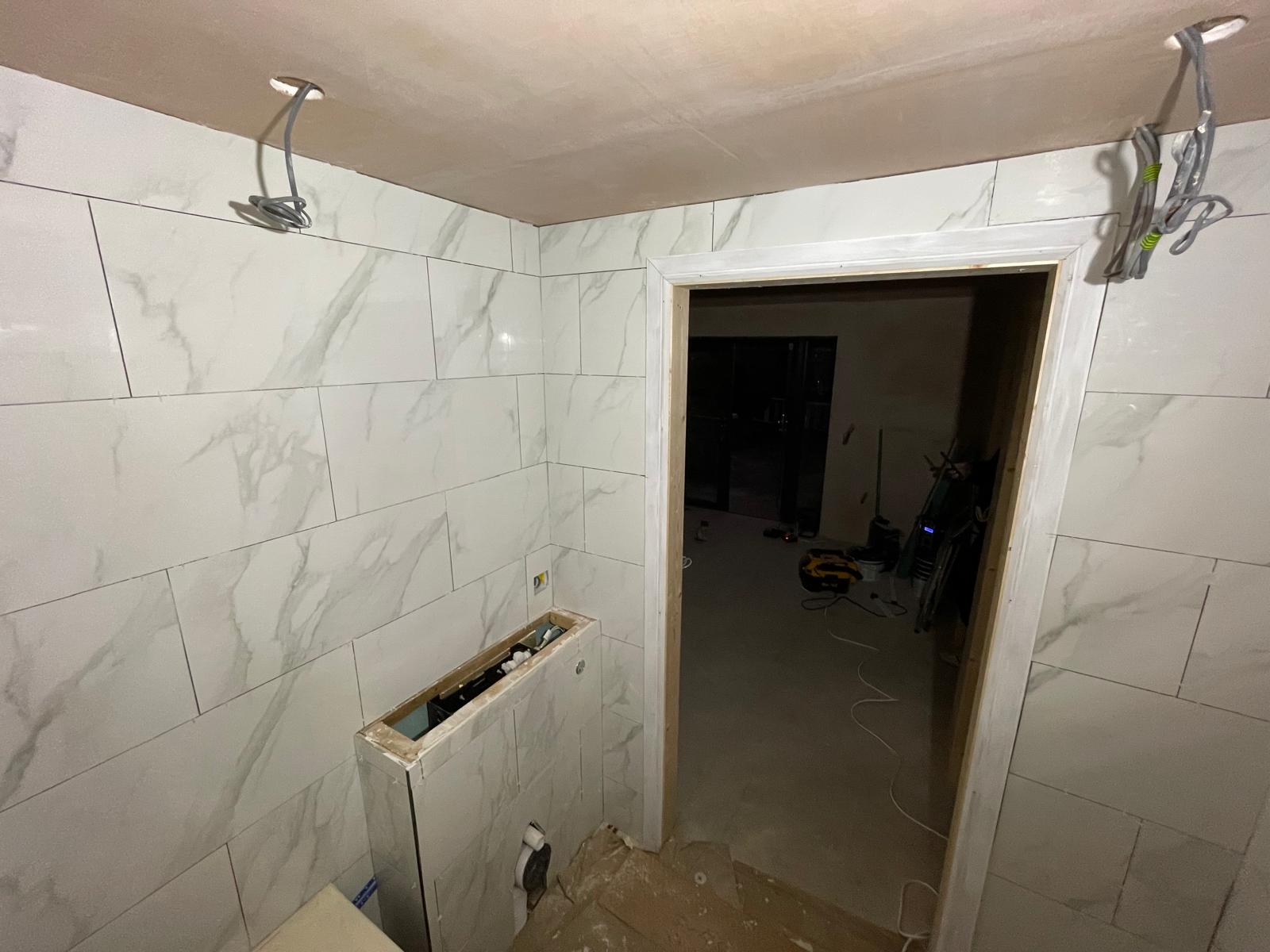 Ceiling and electrics prepared for painting and lights to be installed on a conversion project