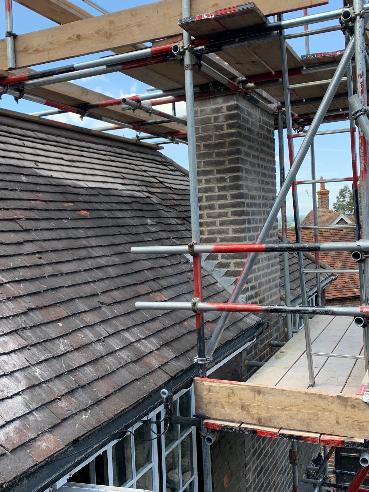 Chimney re pointing on a roofing project in Kent