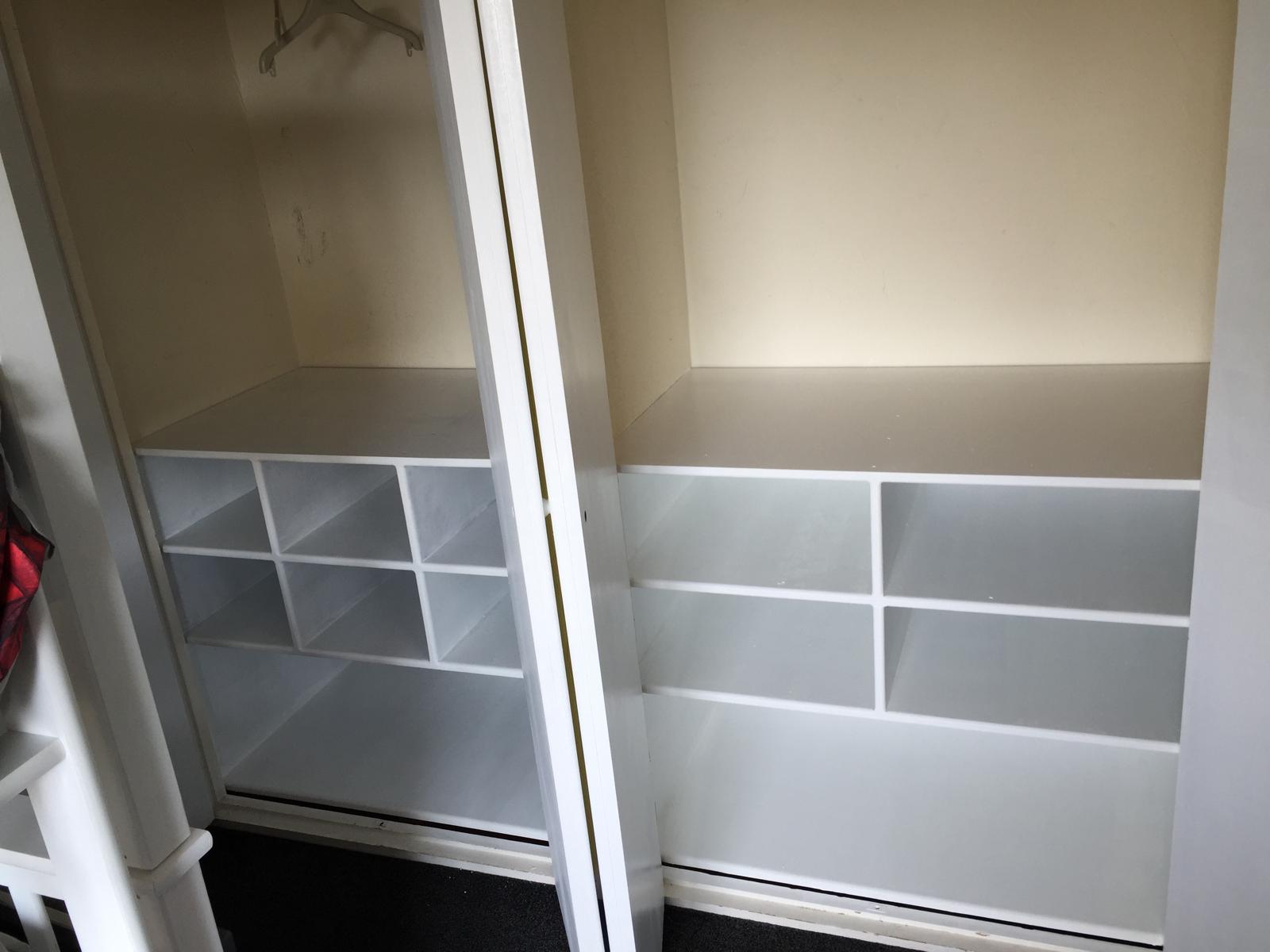 Complete built in shelving section inside a wardrobe