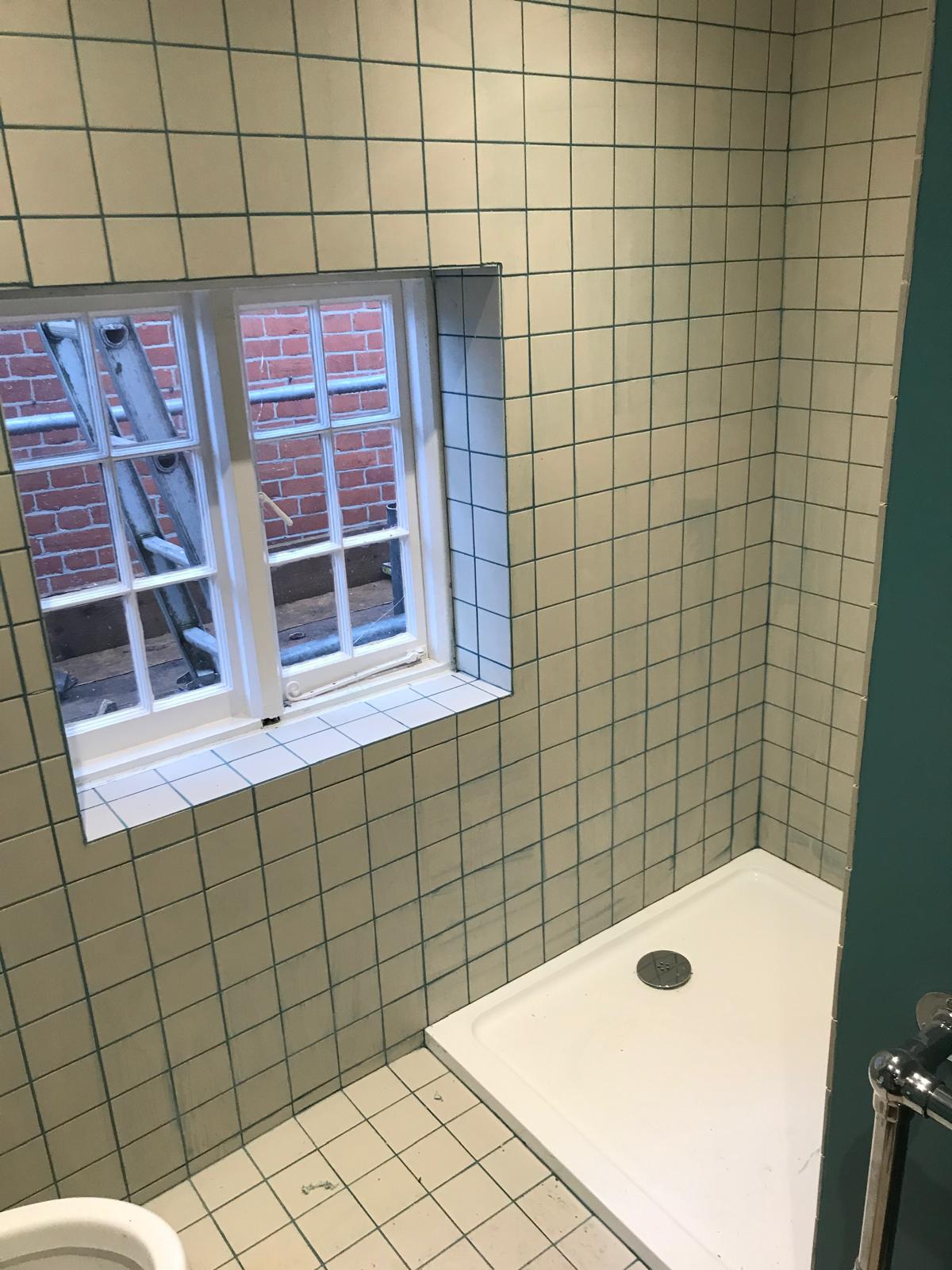 Complete white tile installation on bathroom project in Kent