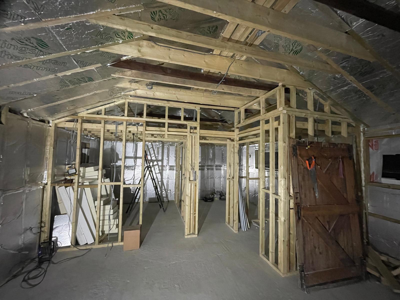 Conversion project wooden frame stud and insulation installation