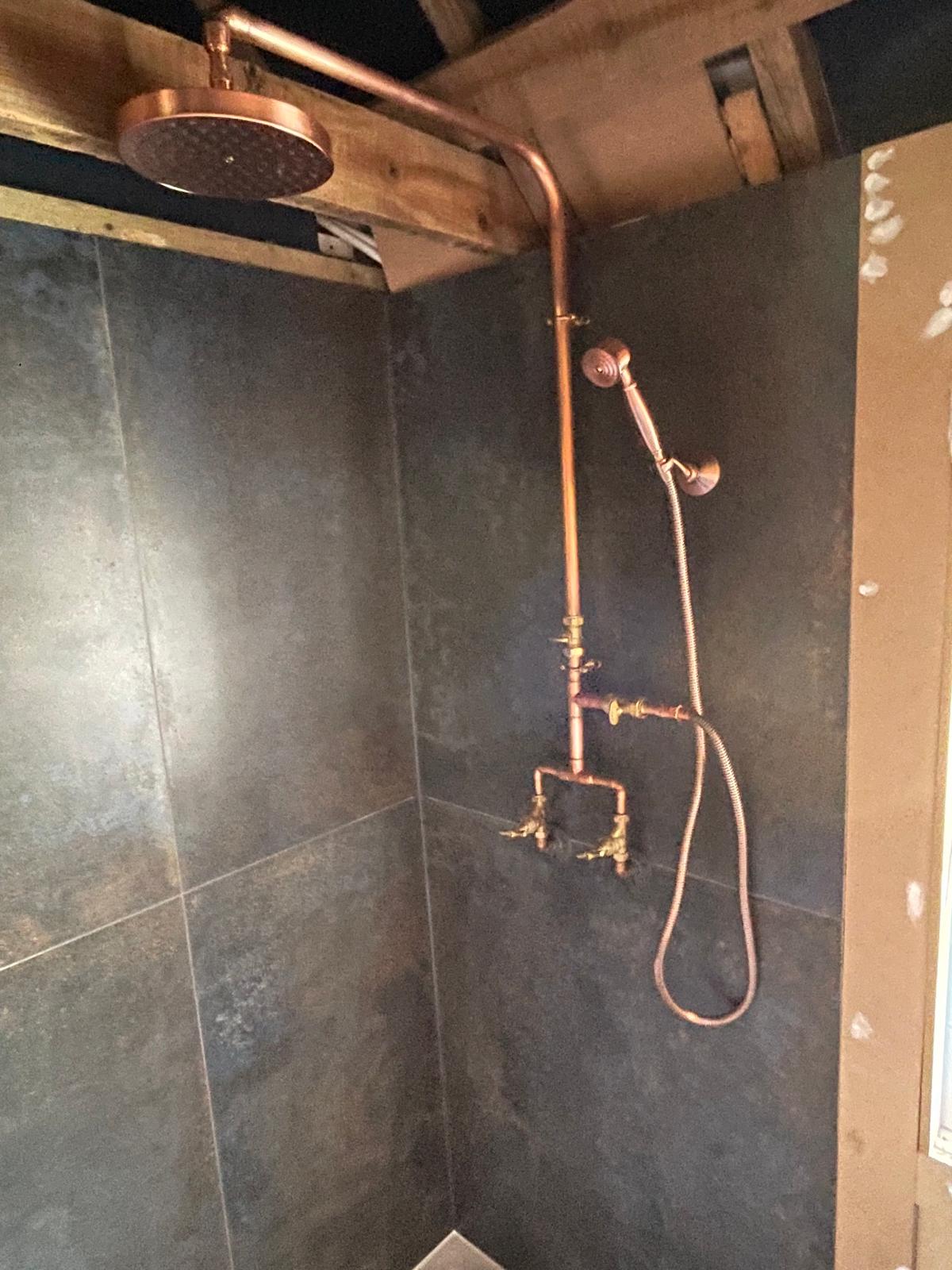 Copper shower installed on a bathroom project
