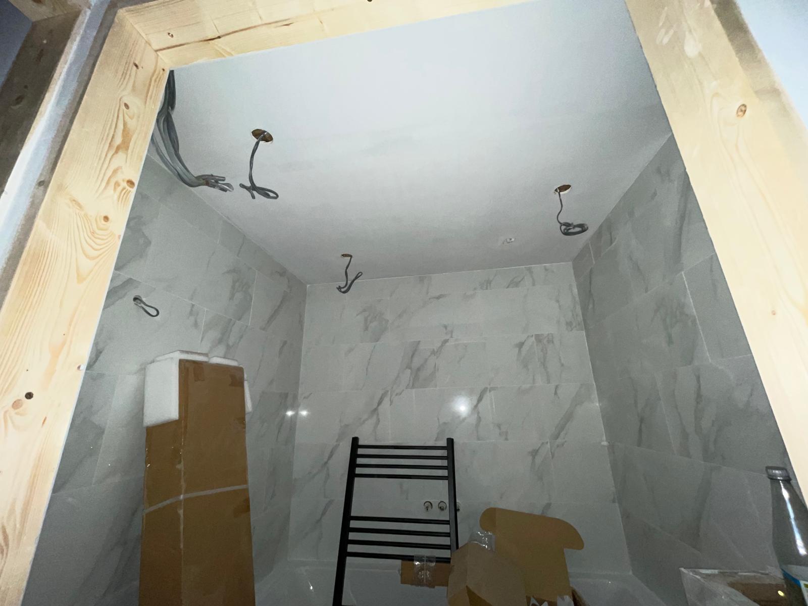 Door frame installed in bathroom area on a conversion project