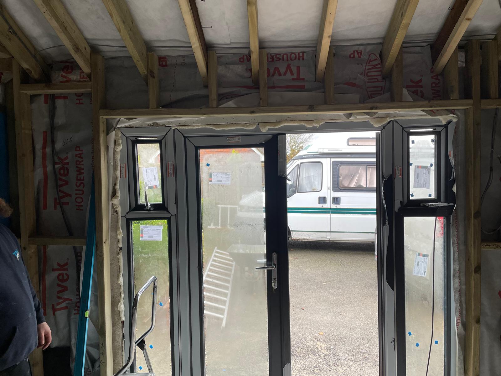 Door installation and wall insulation for a project in Kent