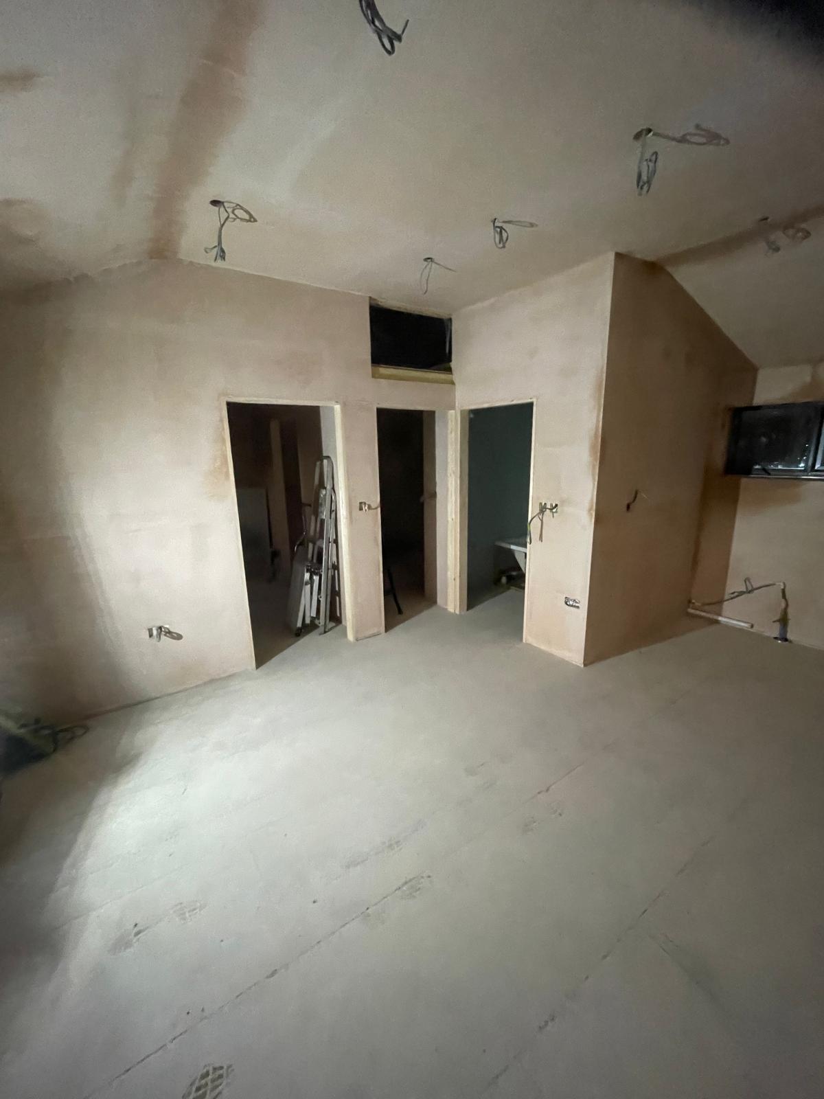 Door placements set walls and electrics prepared for painting and light installation for a conversion project in Kent