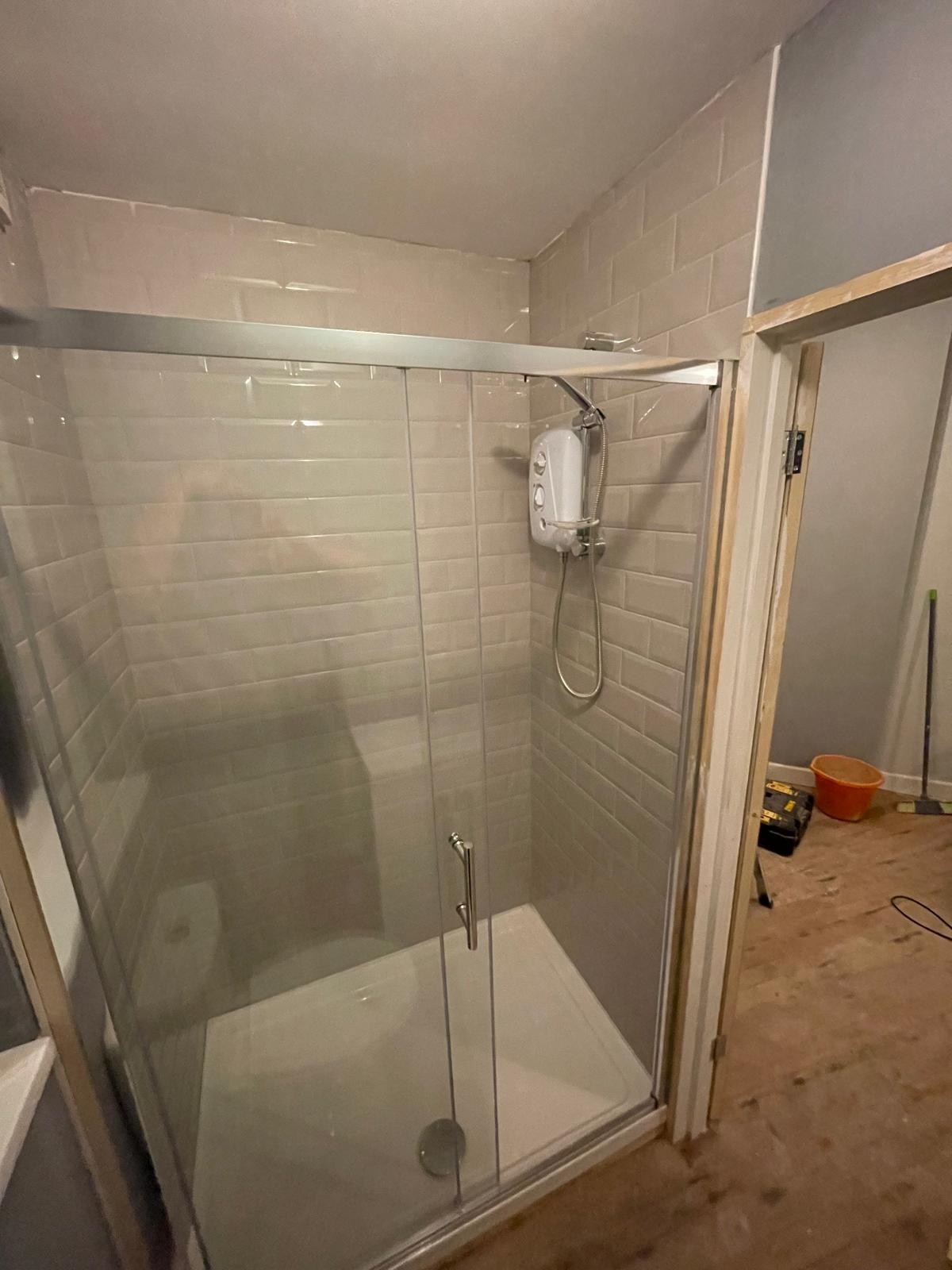 Double shower installation for a bathroom project in Kent