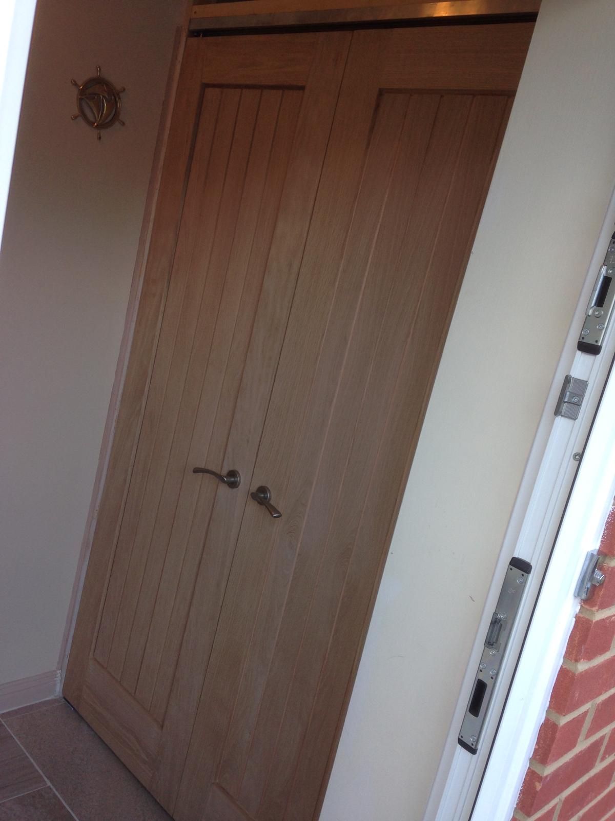 Double wood effect door installation for a decorating project in Kent