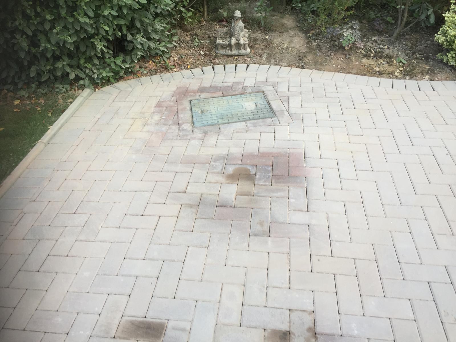 Drain section on a blocked paved driveway project