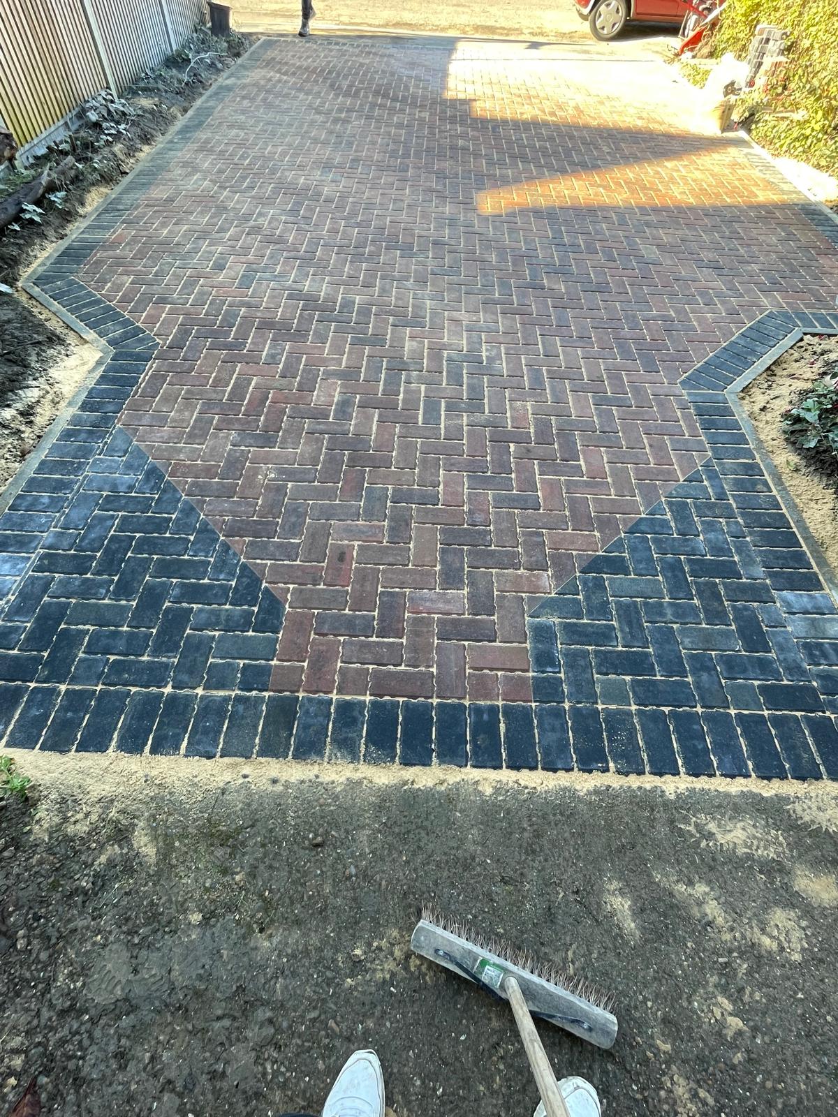 Driveway installation with corner pattern for a local project in Kent