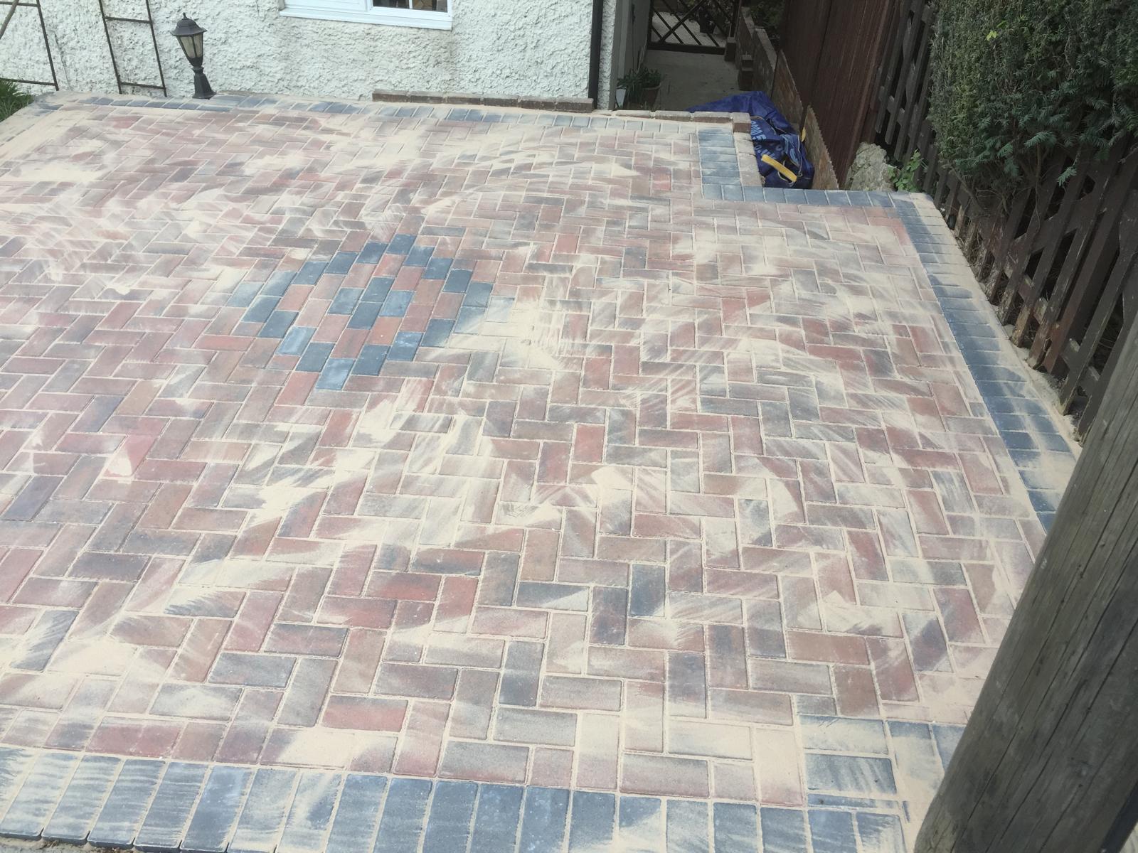 Driveway installation with diamond pattern for a local project in Kent