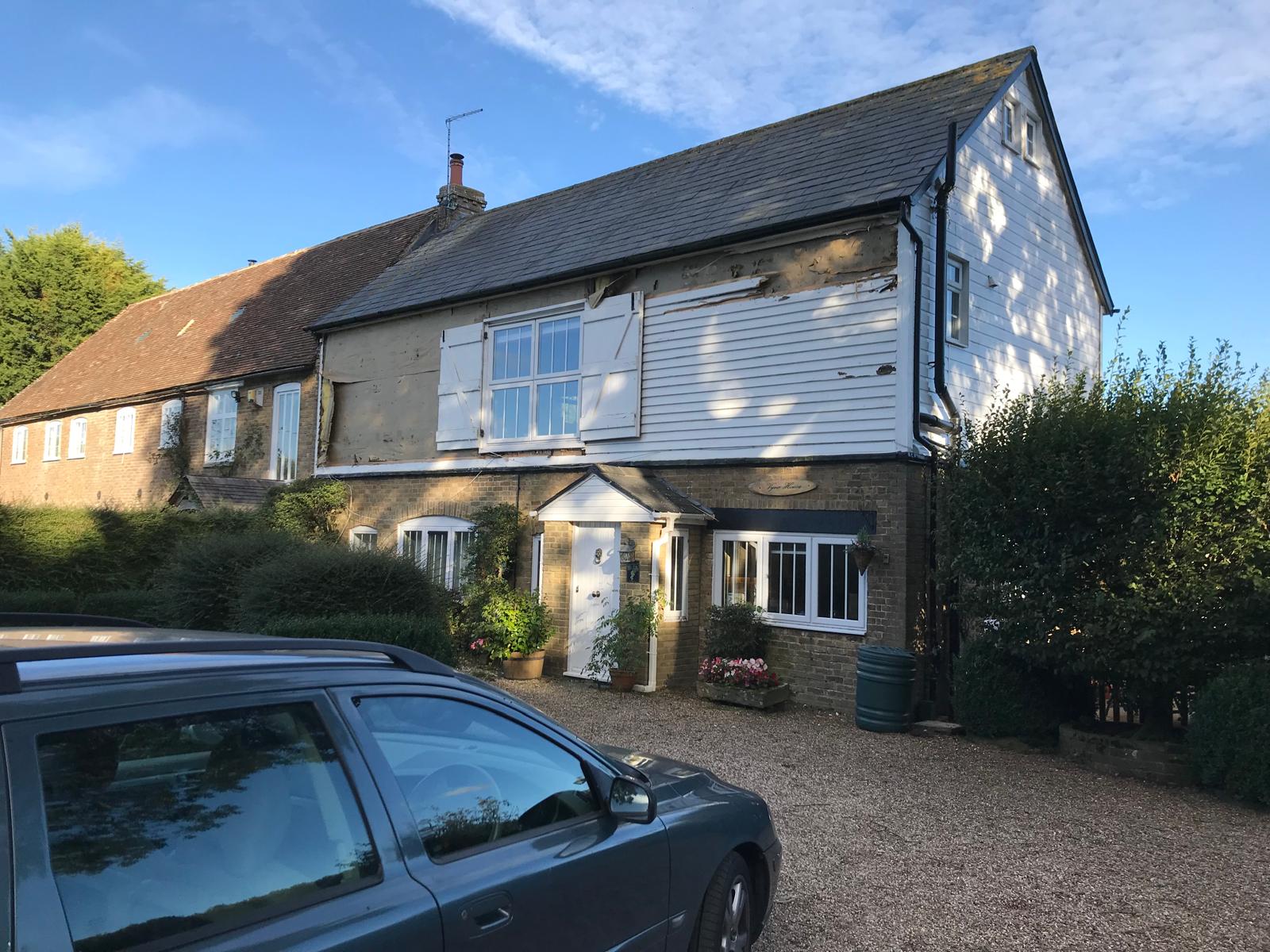 Exterior house cladding installation project