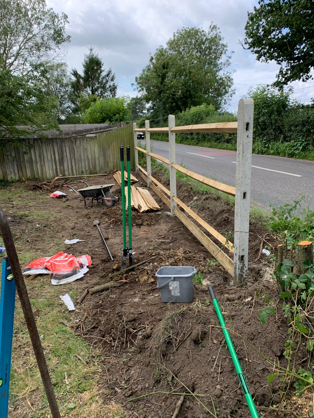 Fencing being installed on a landscaping project in Kent
