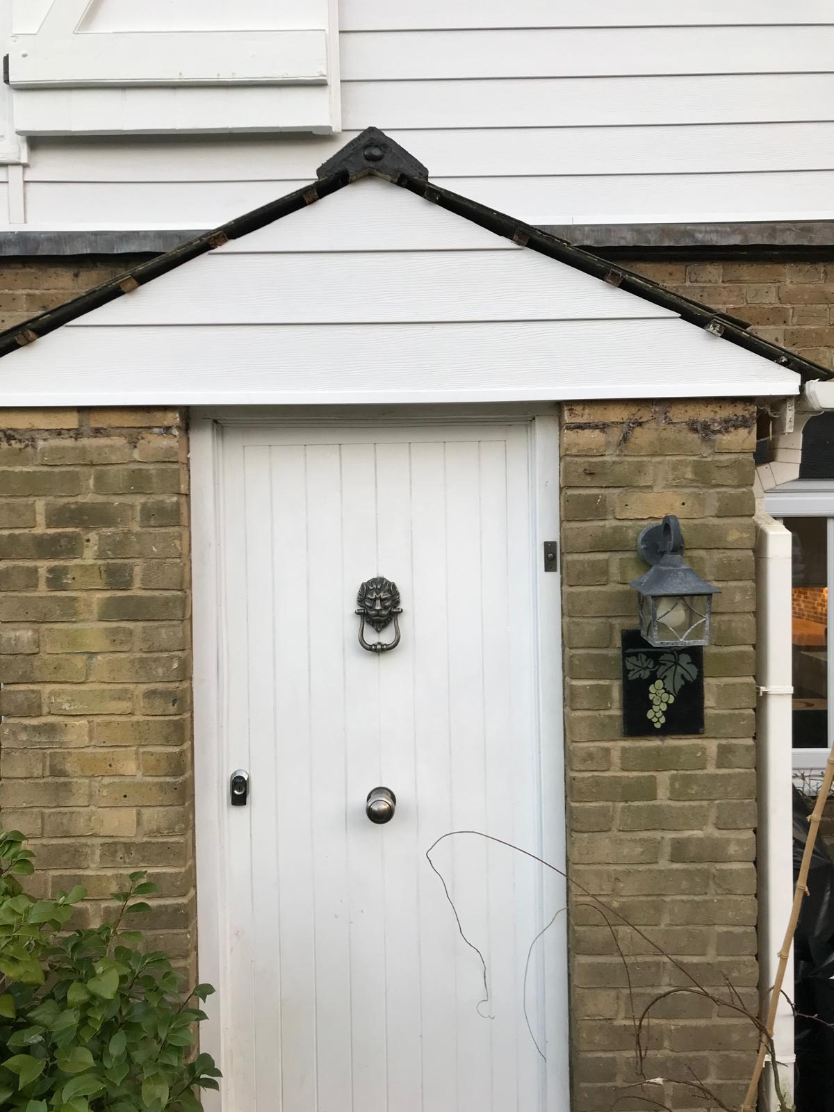 Front of porch cladding installed
