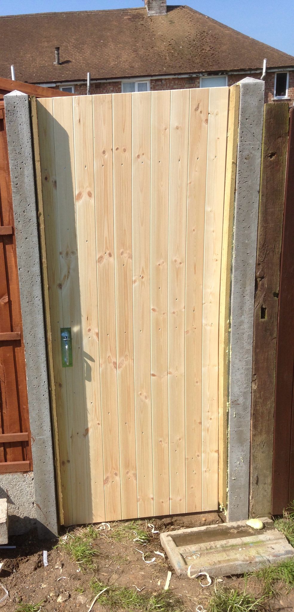 Gate been installed on local fencing project in Kent