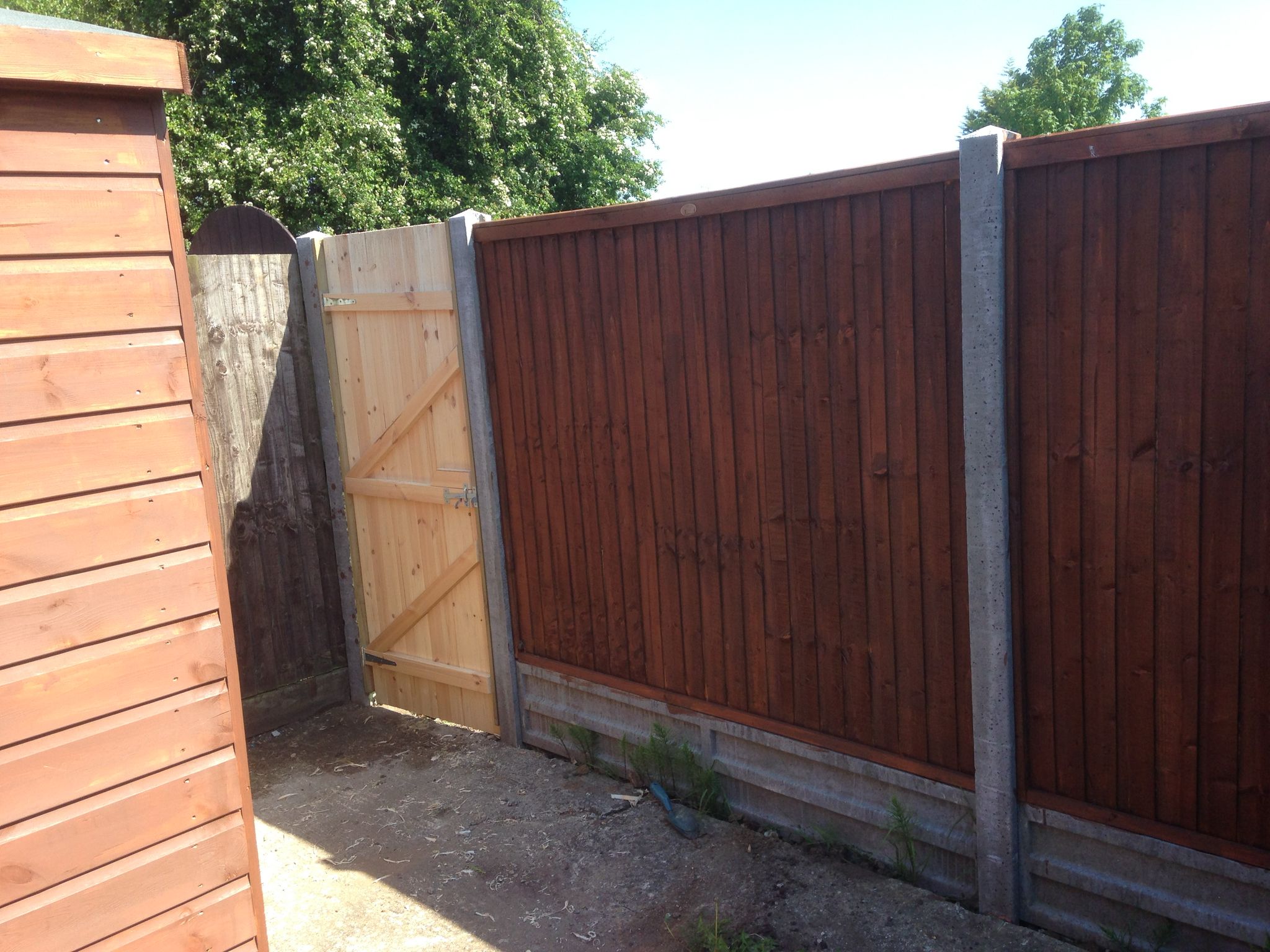 Gate installation on a fencing project in Kent